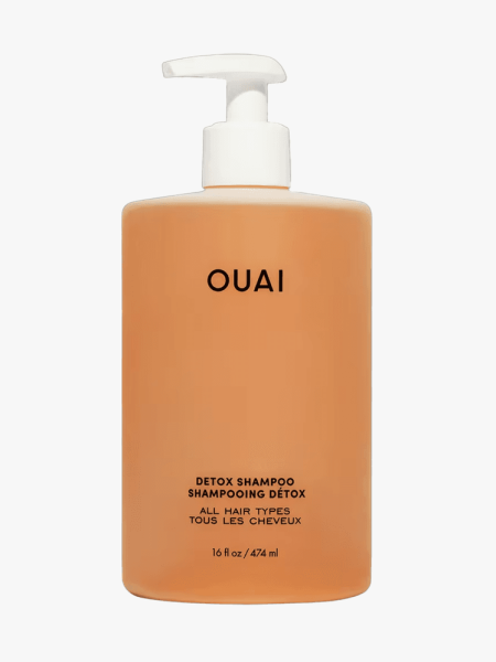 Ouai Detox Shampoo in branded component on a light grya background